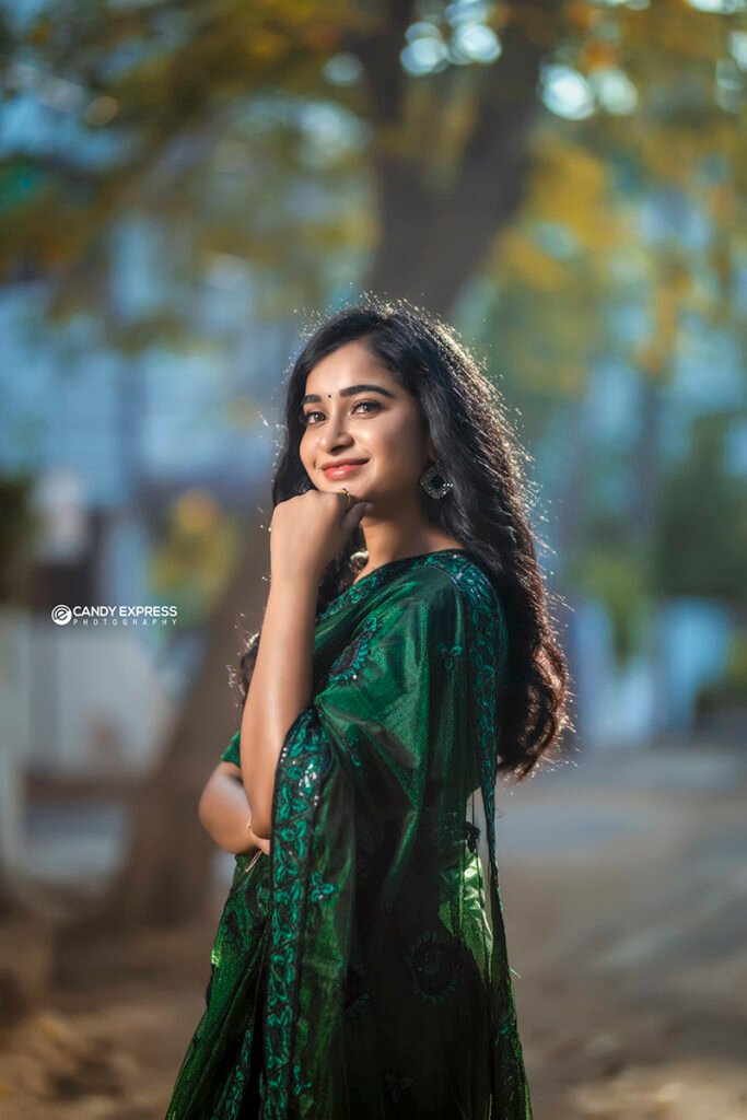 model poses female in saree